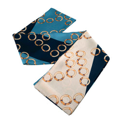 Aura Estelle Twilly Scarf blue chain links scarf laid flat