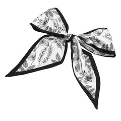 Aura Estelle Twilly Scarf monotone leaves print tied as a bow