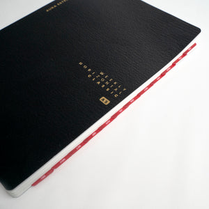 Aura Estelle Skinny Tab Stickers Red red skinny tabs applied to black notebook edge
