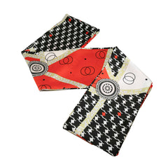 Aura Estelle Twilly Scarf black and red pattern scarf laid flat